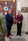 Mr. Michael Durkin, Director of the Navy Warfare Development Center (NWDC), speaks with U.S. Senator Tim Kaine (VA) during his visit to NWDC in Norfolk, Va., on Aug. 4, 2025. Senator Kaine, a member of the Senate Armed Services Committee, received an overview of the Navy’s evolving warfighting concepts and preparations for Large Scale Exercise (LSE) 2025, which will test the Fleet’s ability to conduct integrated, distributed maritime operations across multiple theaters.