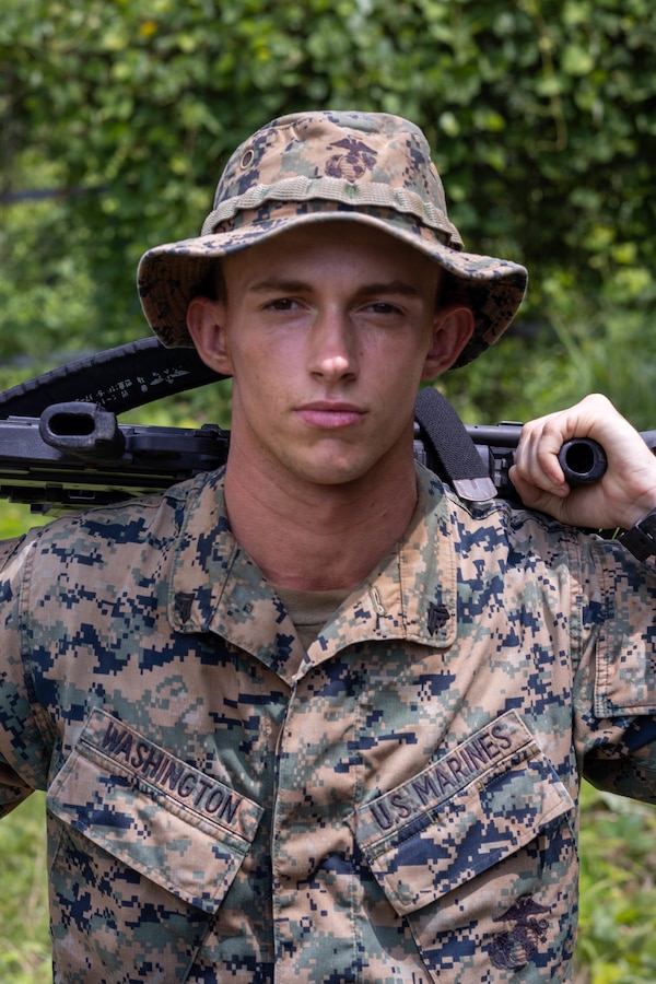 U.S. Marine Corps Cpl. Jesse Washington, a rifleman with 2nd Battalion, 23rd Marines, forward deployed with 4th Marine Regiment, 3d Marine Division as part of the Unit Deployment Program, poses for a photo during the Korean Marine Exercise Program 25.2 in Pohang, South Korea, Aug. 7, 2025. KMEP is conducted regularly between the ROK and U.S. Marine Corps to increase their combined capabilities through realistic training geared towards deterrence and maintaining peace in the Indo-Pacific. Washington is a native of Alabama. (U.S. Marine Corps photo by Cpl. Kanoa Thomas)