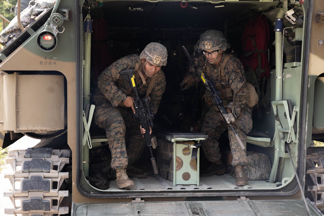 U.S. Marines with 2nd Battalion, 23rd Marines, forward deployed with 4th Marine Regiment, 3rd Marine Division as part of the Unit Deployment Program, disembark a Republic of Korea Marine Corps Assault Amphibious Vehicle during military operations on urban terrain training during the Korean Marine Exercise Program 25.2, Pohang, South Korea, Aug. 8, 2025. KMEP is conducted regularly between the ROK and U.S. Marine Corps to increase their combined capabilities through realistic training geared towards deterrence and maintaining peace in the Indo-Pacific.  (U.S. Marine Corps photo by Cpl. Kanoa Thomas)