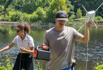 DAHLGREN, Va. – Science and Engineering Apprenticeship Program interns prepare equipment for testing an unmanned surface vessel at Hideaway Pond during their final project demonstration at Naval Surface Warfare Center Dahlgren Division (NSWCDD). (Morgan Lee Tabor/NSWCDD Photo)
