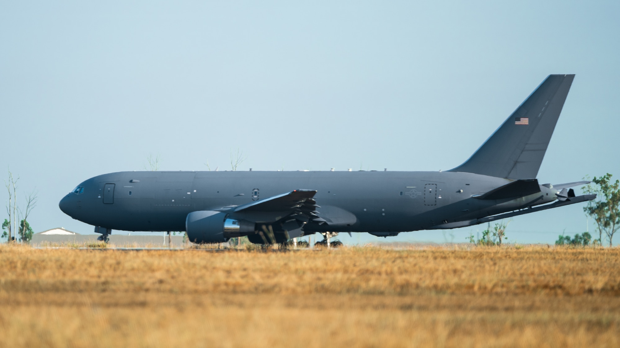 A U.S. Air Force KC-46 Pegasus aircraft from Joint Base McGuire-Dix-Lakehurst, N.J., taxis on the flight line for an aerial refueling mission during Talisman Sabre 25 in the Northern Territory, Australia, July 16, 2025. The exercise provides rapid global mobility, enabling Joint Force maneuverability and sustained operations in multiple theaters simultaneously – a critical asymmetric advantage. Talisman Sabre is the largest bilateral military exercise between Australia and the U.S. that advances a safe and secure Indo-Pacific region by strengthening relationships and interoperability among key Allies and partners, while enhancing collective capabilities to respond to a wide array of potential security concerns. (U.S. Air Force photo by Staff Sgt. Alex Lowe)