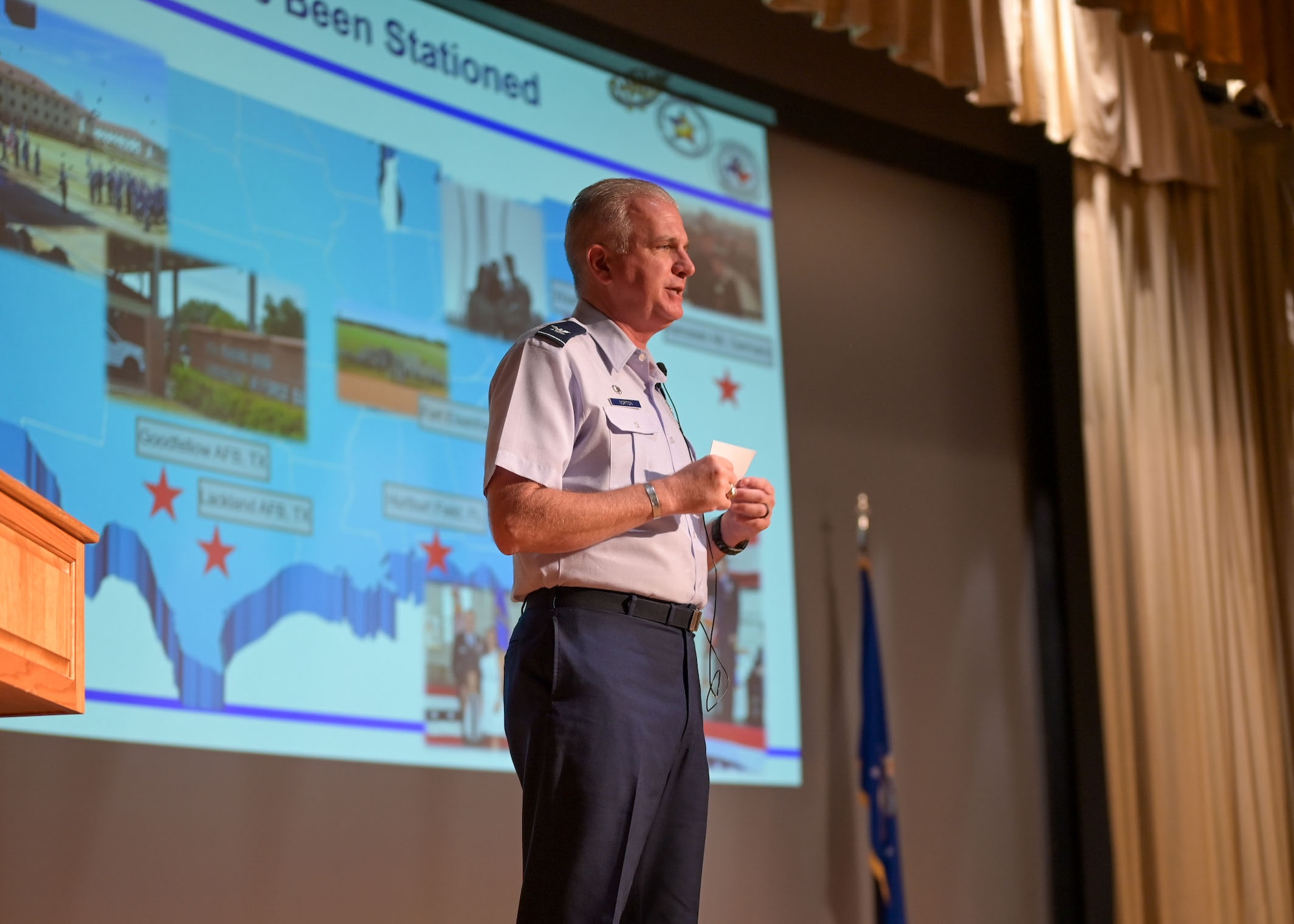 U.S. Air Force Col. Matthew Norton, 17th Training Wing commander, speaks at his first Commander’s All-Call and 2nd Quarterly Awards Ceremony at the base theater, Goodfellow Air Force Base, Texas, Aug. 8, 2025. Norton addressed key initiatives designed to enhance mission effectiveness, align units for operational efficiency and ensure readiness. (U.S. Air Force photo by Senior Airman Evelyn D’Errico)