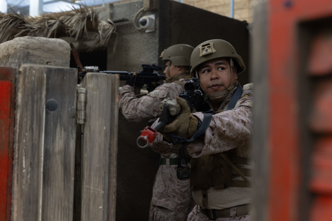 U.S. Marine Corps Lance Cpl. Roman Marcelino, a radio operator with 4th Air Naval Gunfire Liaison Company, Force Headquarters Group, Marine Corps Forces Reserve, posts security during exercise Burmese Chase 25 at Marine Corps Base Camp Lejeune, North Carolina, Aug. 8, 2025. Burmese Chase is an annual U.S. led, multi-lateral training exercise comprised of integrating ground and air fires, infantry tactics and naval gunfire alongside NATO allies to enhance combat readiness and interoperability. (U.S. Marine Corps photo by LCpl. Weston Lindstrom)