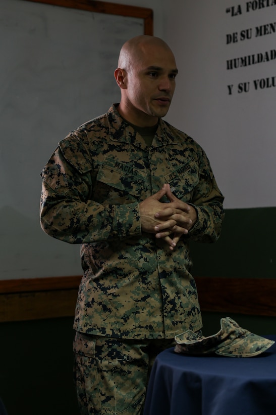 U.S. Marine Corps Master Sgt. Sergio Macias, an infantry unit leader with Marine Forces Norther Command, introduces himself during a subject matter expert exchange with members of the Uruguayan marine corps in Uruguay, August 11, 2025. This subject matter expert exchange enhances the training and readiness standards for the United States and Uruguay as well as facilitating the exchange of formalized readiness standards between both countries. Macias is a native of California. (U.S. Marine Corps photo by Sgt. Eduardo Delatorre)
