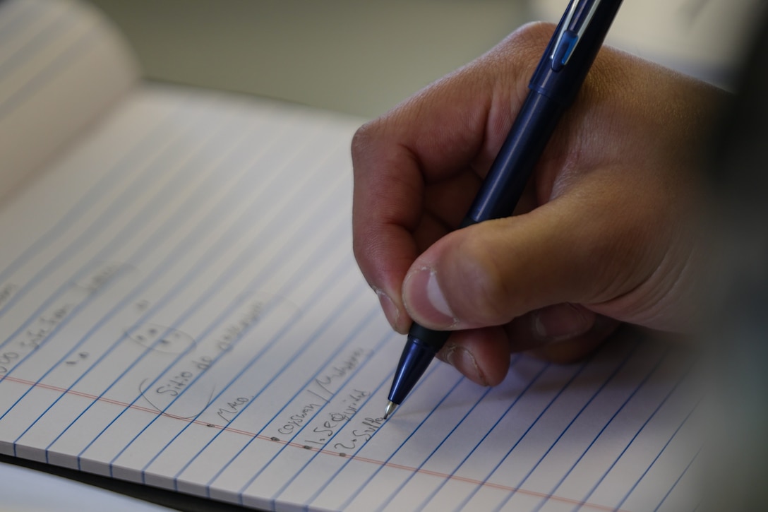 U.S. Marine Corps Sgt. Ronald Arce, an infantry rifleman with U.S. Marine Forces, South, writes notes during a subject matter expert exchange  in Uruguay, August 11, 2025. This subject matter expert exchange enhances the training and readiness standards for the United States and Uruguay as well as facilitating the exchange of formalized readiness standards between both countries. Arce is a native of Texas. (U.S. Marine Corps photo by Sgt. Eduardo Delatorre)