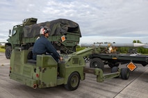 U.S. Marines with Marine Attack Squadron 223 prepare AV-8B Harriers for ordnance training