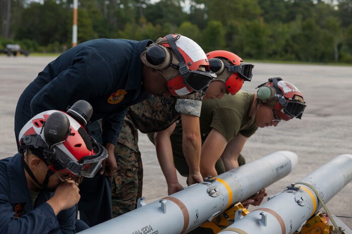 U.S. Marines with Marine Attack Squadron 223 prepare AV-8B Harriers for ordnance training