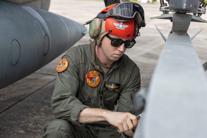 U.S. Marines with Marine Attack Squadron 223 prepare AV-8B Harriers for ordnance training