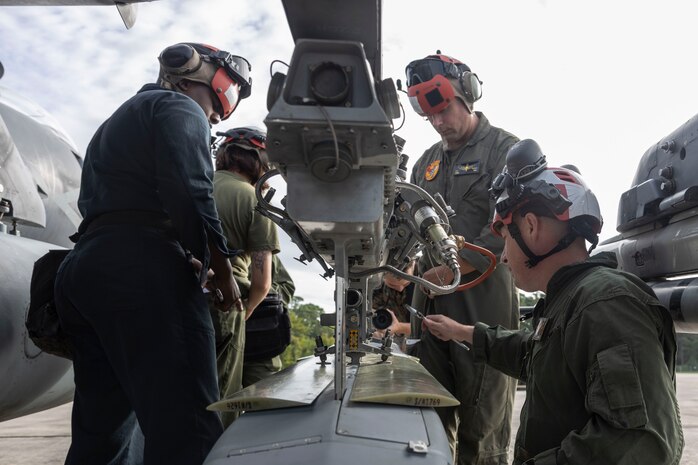 U.S. Marines with Marine Attack Squadron 223 prepare AV-8B Harriers for ordnance training