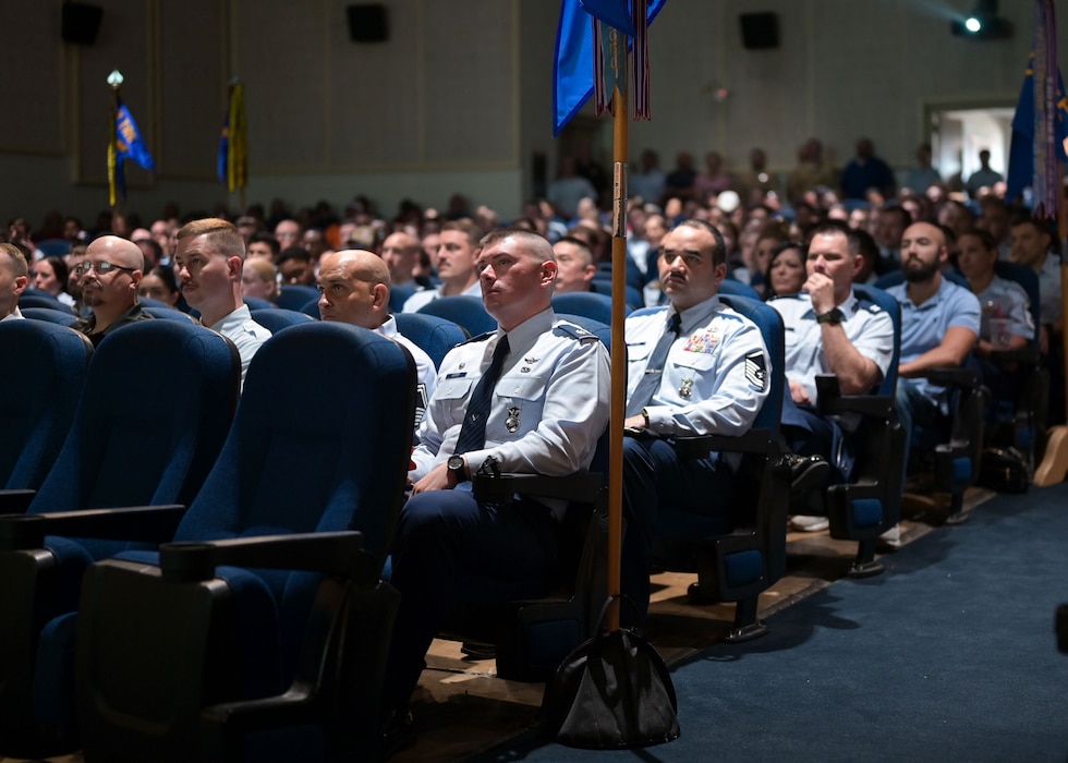 Members of the 17th Training Wing attend the Commander’s All-Call and 2nd Quarterly Awards Ceremony at the base theater, Goodfellow Air Force Base, Texas, Aug. 8, 2025. Following opening speeches, the ceremony shifted to quarterly awards, a tradition that honors exceptional individuals for their outstanding contributions to the 17th TRW mission.  (U.S. Air Force photo by Senior Airman Evelyn D’Errico)