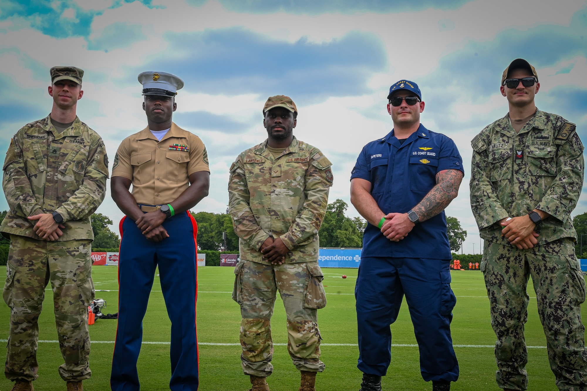 U.S. service members from all branches stand on the sideline at the NovaCare Complex during Military Appreciation Day, hosted by the Philadelphia Eagles, July 26, 2025.