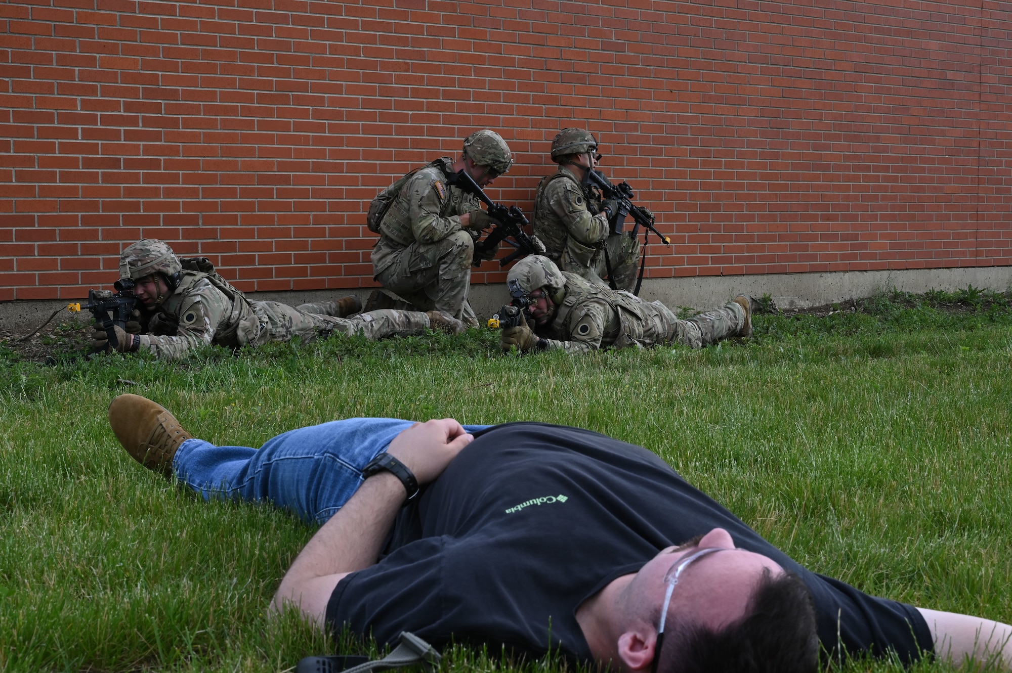 Soldiers with the 1st Battalion, 148th Infantry Regiment, 37th Infantry Brigade Combat Team conduct sweeps in a simulated contested location June 7, 2025, at the 178th Ohio Air National Guard Base in Springfield, Ohio, during Exercise Relentless Valor, supporting a large-scale joint medical exercise focused on enhancing readiness in contested environments. (U.S. Air National Guard photo by Staff Sgt. Colin Simpson)