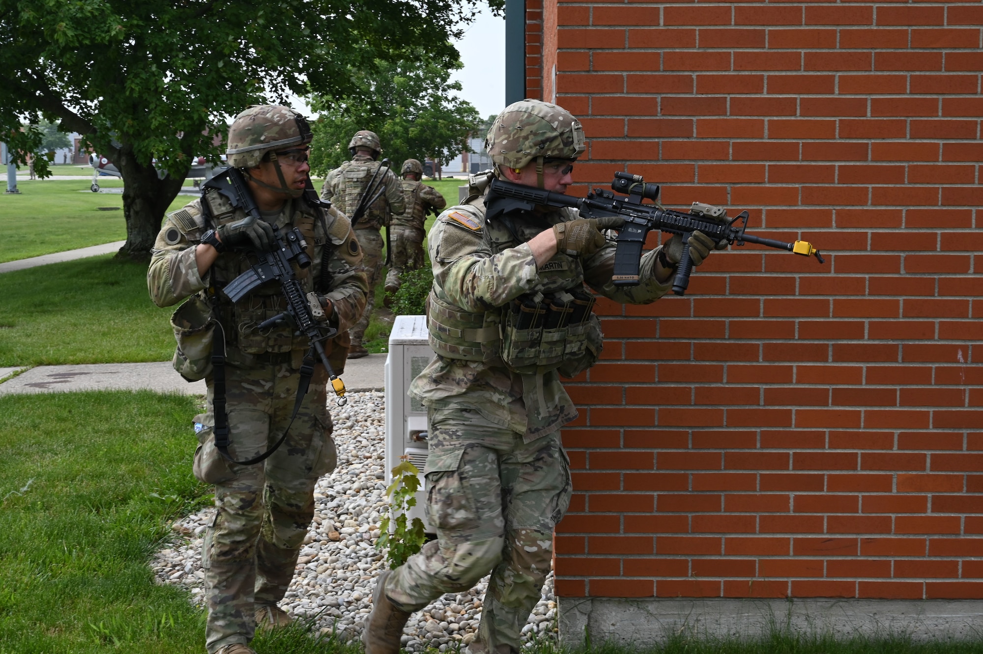 Soldiers with the 1st Battalion, 148th Infantry Regiment, 37th Infantry Brigade Combat Team conduct sweeps in a simulated contested location June 7, 2025, at the 178th Ohio Air National Guard Base in Springfield, Ohio, during Exercise Relentless Valor, supporting a large-scale joint medical exercise focused on enhancing readiness in contested environments. (U.S. Air National Guard photo by Staff Sgt. Colin Simpson)