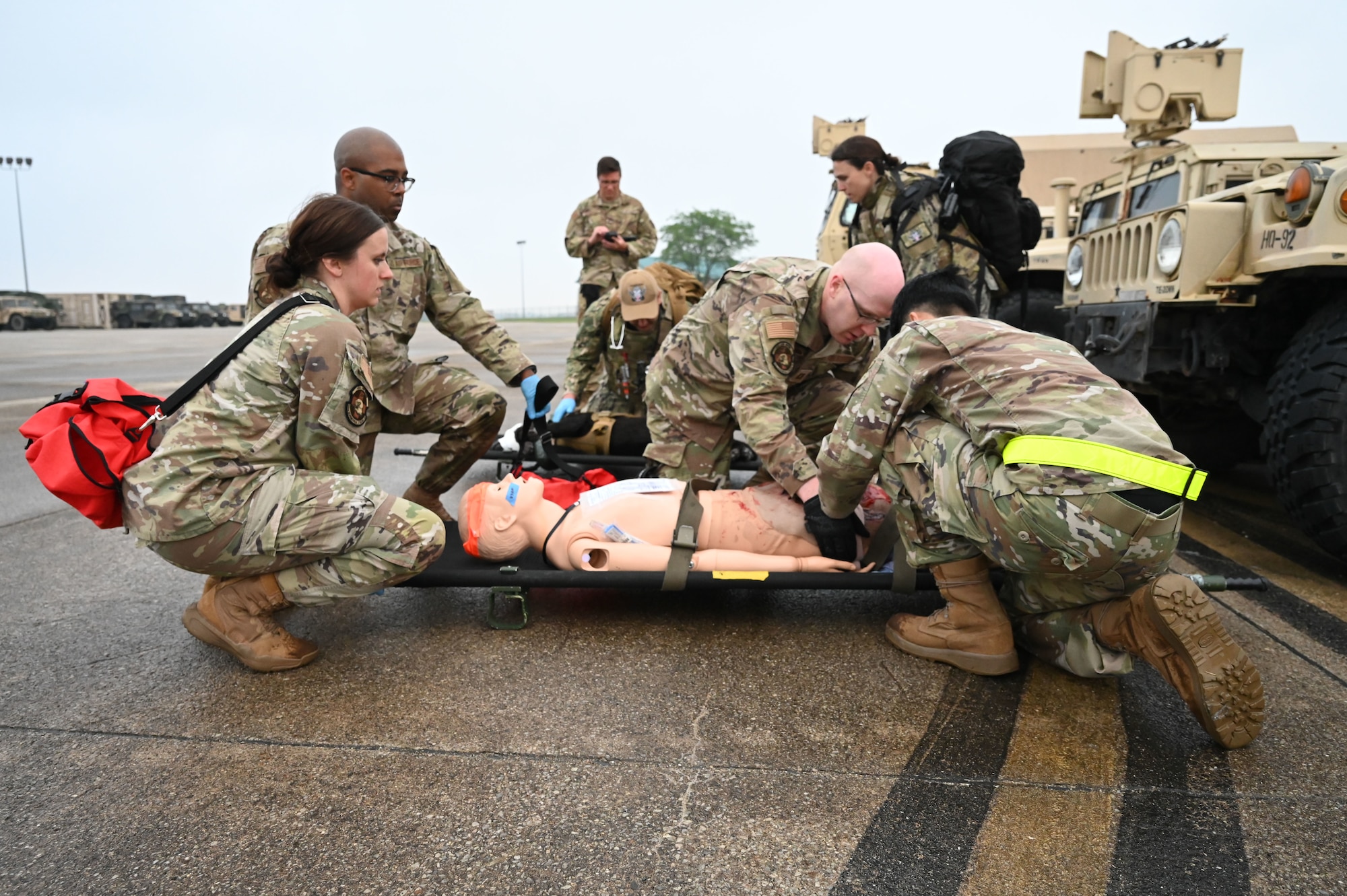 Airmen assigned to the 445th Aeromedical Staging Squadron conducted initial evaluation and first aid on casualty dummy June 7, 2025, at the 178th Ohio Air National Guard Base in Springfield, Ohio, as part of Exercise Relentless Valor. The large-scale medical exercise ensured higher command readiness requirements were met through coordinated medical care on the ground and in the air. (U.S. Air National Guard photo by Staff Sgt. Colin Simpson)