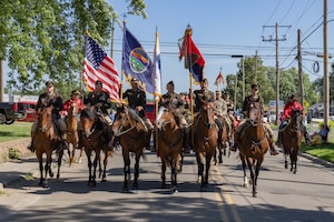 1st Infantry Division Soldiers participate in the annual Junction City Freedom Fest, in Junction City, KS, on July 4, 2025. Independence Day is commemorated by a parade through town, followed by a memorial wreath-laying to honor those Soldiers lost in service to their country.  (U.S. Army photos by Sgt. Tyler Selige)