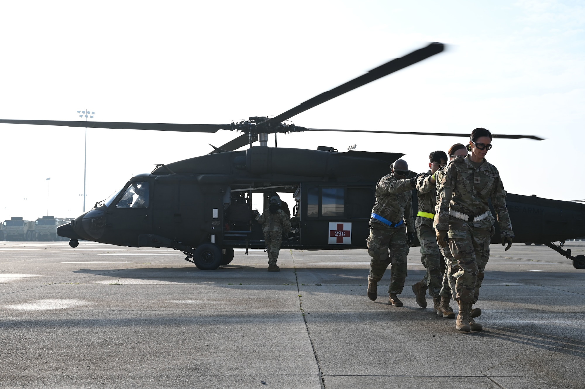U.S. military forces and Airmen assigned to the 445th Aeromedical Staging Squadron take part in a simulated medical evacuation June 7, 2025, at the 178th Ohio Air National Guard Base in Springfield, Ohio, as part of Exercise Relentless Valor. The large-scale medical exercise ensured higher command readiness requirements were met through coordinated medical care on the ground and in the air. (U.S. Air National Guard photo by Staff Sgt. Colin Simpson)