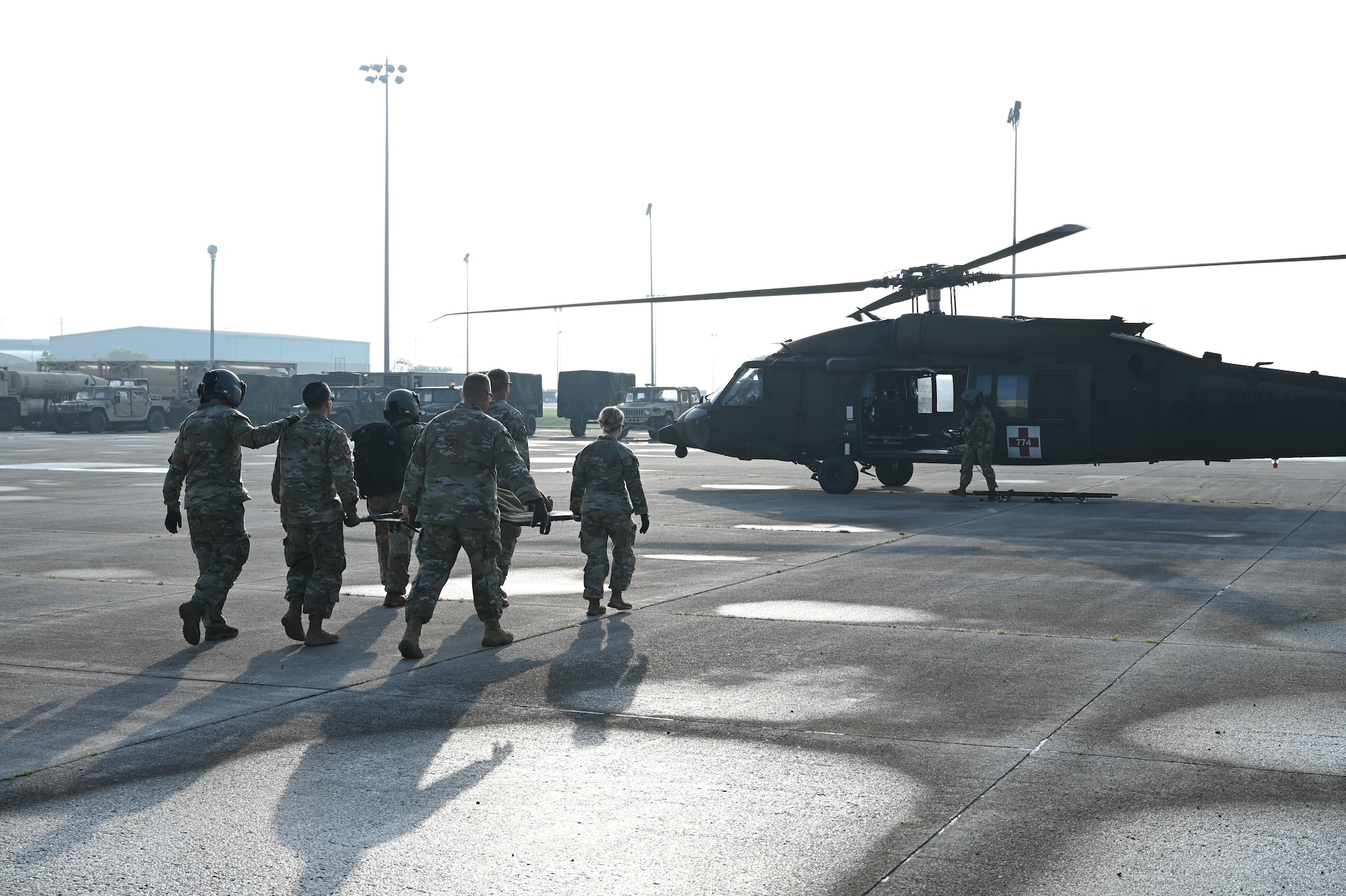 U.S. military forces and Airmen assigned to the 445th Aeromedical Staging Squadron take part in a simulated medical evacuation June 7, 2025, at the 178th Ohio Air National Guard Base in Springfield, Ohio, as part of Exercise Relentless Valor. The large-scale medical exercise ensured higher command readiness requirements were met through coordinated medical care on the ground and in the air. (U.S. Air National Guard Photo by Staff Sgt. Colin Simpson)