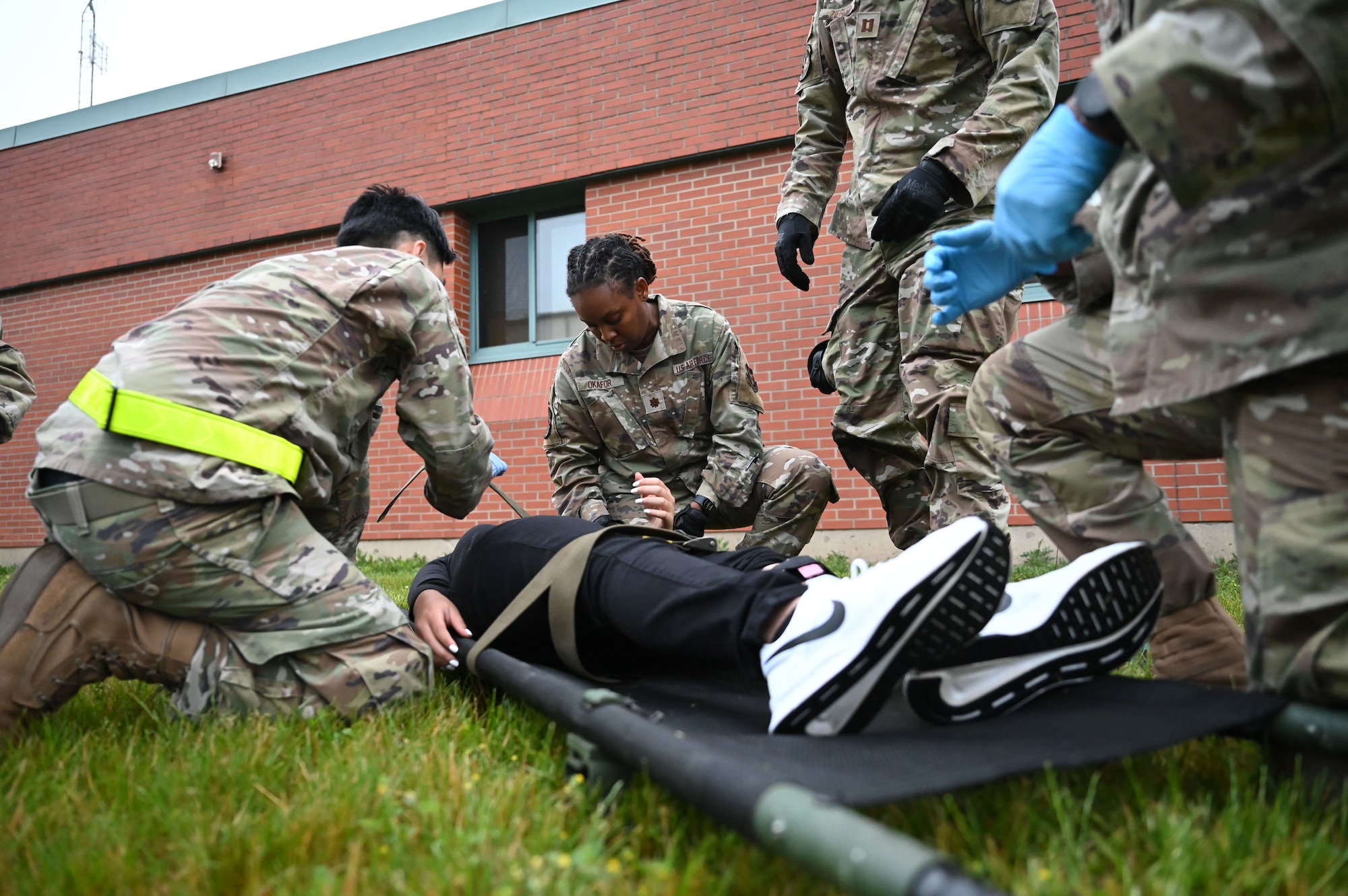 Airmen assigned to the 445th Aeromedical Staging Squadron conducted initial evaluation and first aid on role-plays June 7, 2025, at the 178th Ohio Air National Guard Base in Springfield, Ohio, as part of Exercise Relentless Valor. The large-scale medical exercise ensured higher command readiness requirements were met through coordinated medical care on the ground and in the air. (U.S. Air National Guard photo by Staff Sgt. Colin Simpson)