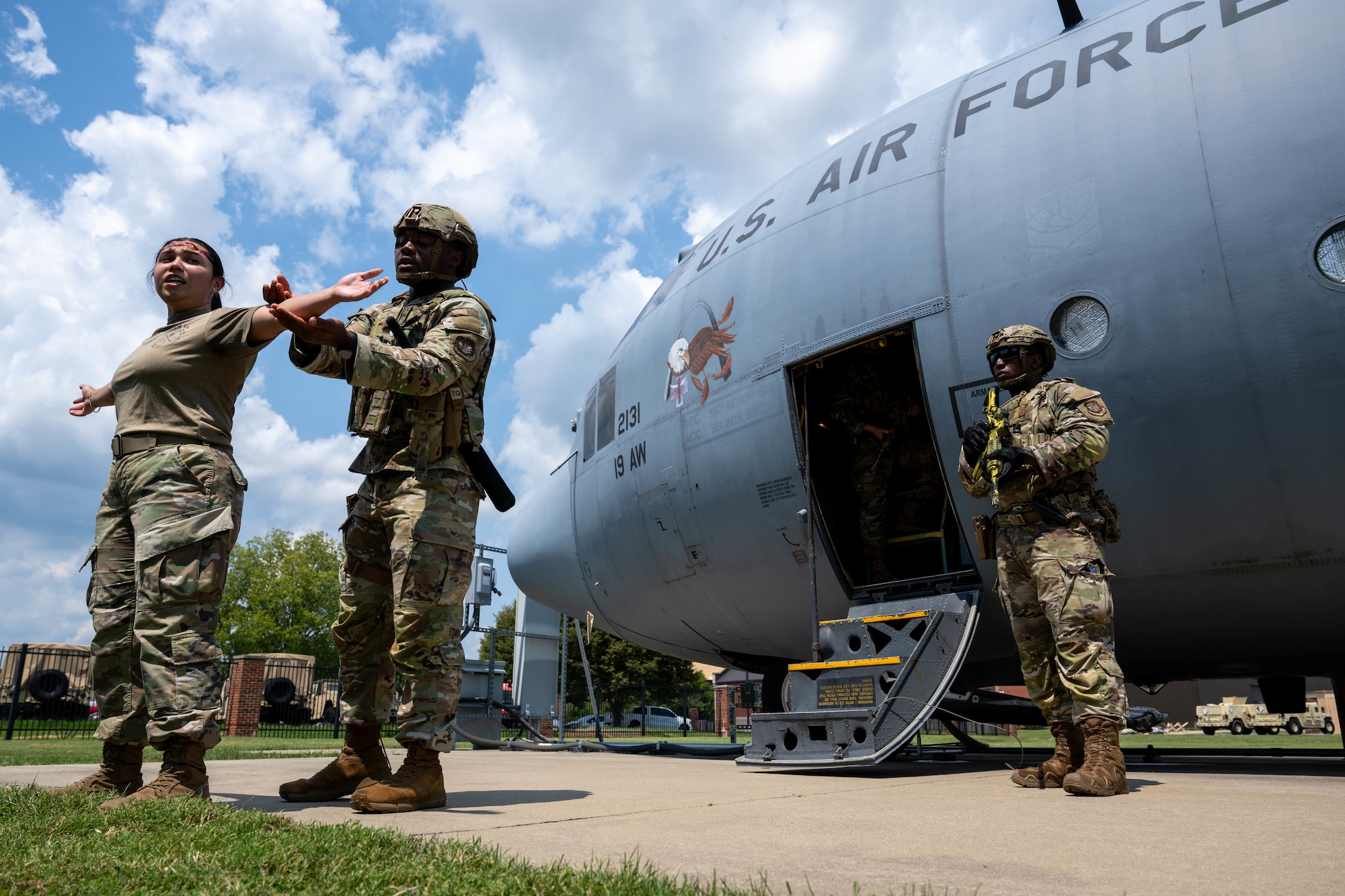 Airman pats down another Airman