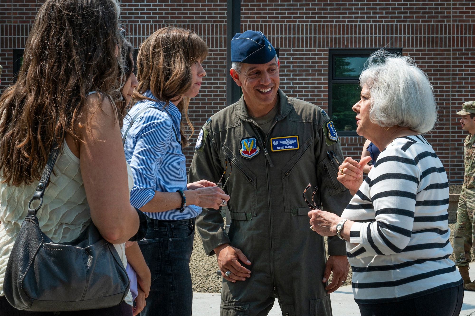 A picture of four people talking.