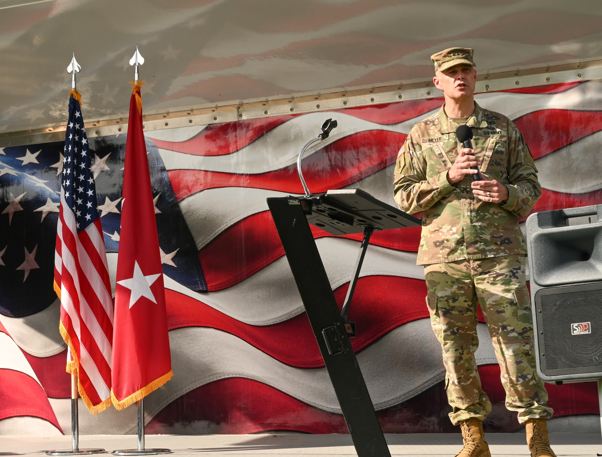 Maj. Gen. Meyer gives his opening statement while standing on the stage at Forge the Force Fest.