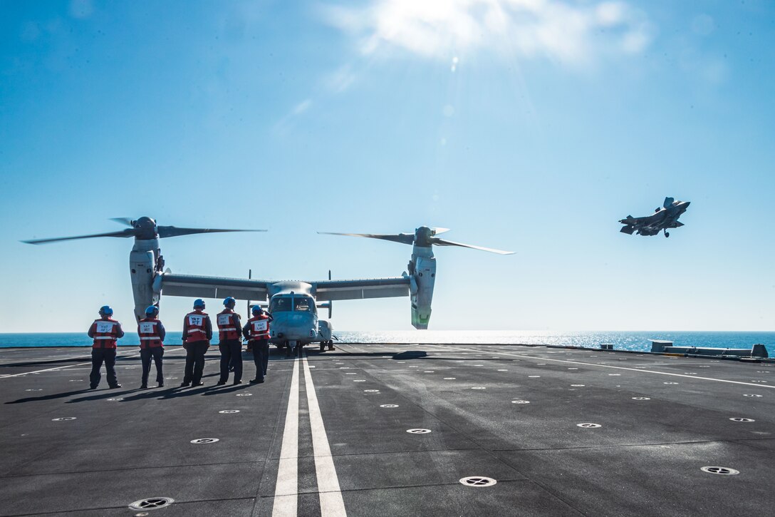 A U.S. Marine Corps MV-22B Osprey assigned to Marine Medium Tiltrotor Squadron (VMM) 363, Marine Rotational Force – Darwin 25.3, stages on the HMS Prince of Wales, a Royal Navy Queen Elizabeth-class aircraft carrier, off the coast of Australia, July 21, 2025. MRF-D is an annual six-month rotational deployment to enhance interoperability with the Australian Defence Force and allies and partners and provide a forward postured crisis response force in the Indo-Pacific. (U.S. Marine Corps photo by Cpl. Anita Ramos)
