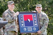 Award being presented to outgoing commander