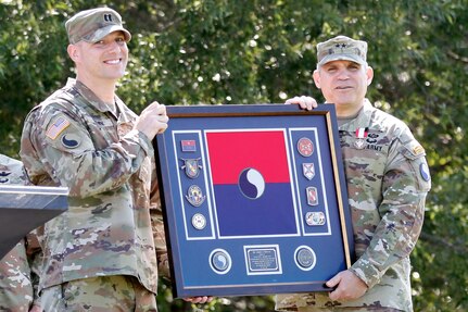 Award being presented to outgoing commander