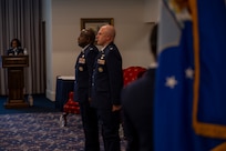 U.S. Air Force Lt. Col. Chad Polumbo, 2nd Intelligence Squadron incoming commander, stands at attention alongside Col. Ryan L. O’Neal, 77th Intelligence Wing commander, during his assumption of command ceremony at Joint Base Anacostia-Bolling, Washington, D.C., July 29, 2025.