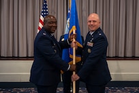 U.S. Air Force Lt. Col. Chad Polumbo, right, takes command of the 2nd Intelligence Squadron as Col. Ryan L. O’Neal, left, 77th Intelligence Wing commander, presides over the assumption of command ceremony at Joint Base Anacostia-Bolling, July 29, 2025.