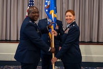 U.S. Air Force Lt. Col. Kathryn Kenan, right, takes command of the 5th Intelligence Support Squadron as Col. Ryan L. O’Neal, left, 77th Intelligence Wing commander, presides over the assumption of command ceremony at Joint Base Anacostia-Bolling, July 29, 2025.