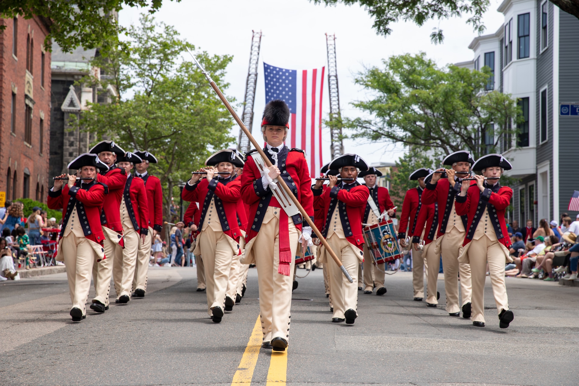 U.S. Army Sgt. 1st Class Erin Morgan, Drum Major of The United States Army Old Guard Fife and Drum Corps, leads a formation of Soldier musicians during the Bunker Hill Parade in Boston, Mass. on June 15, 2025. The Bunker Hill Parade commemorated the 250th Anniversary of the Battle of Bunker Hill, one of the first battles of the American Revolutionary War.