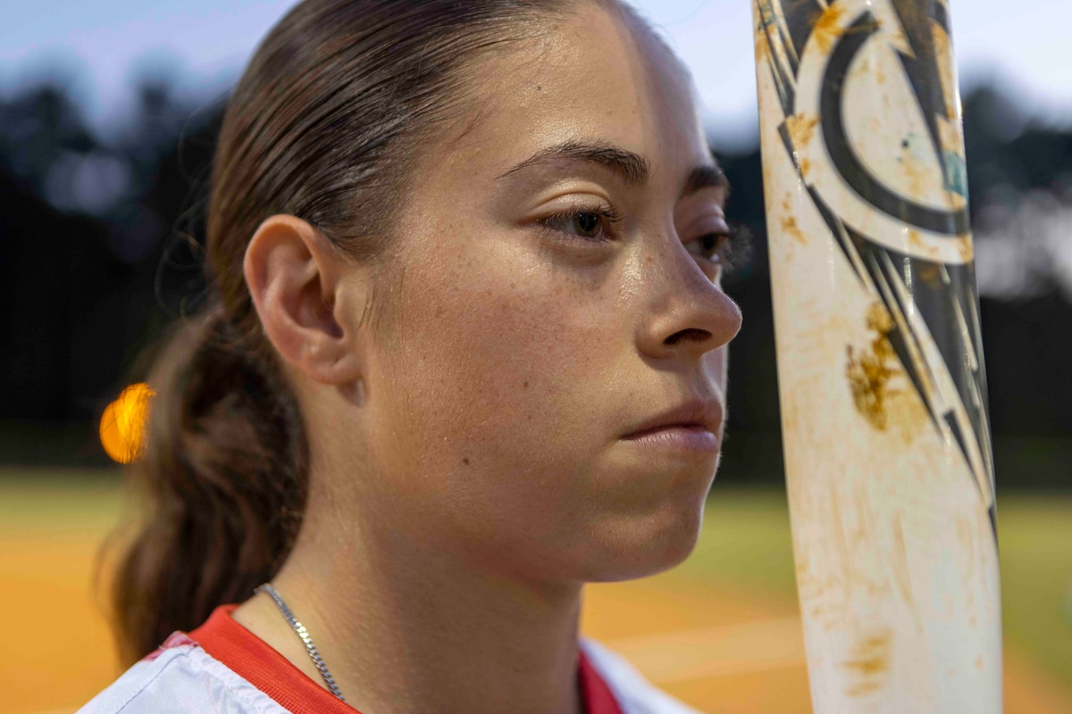 U.S. Marine Corps Lance Cpl. Stephanie Ossorio, an ammunition technician with 2nd Combat Readiness Regiment, 2nd Marine Logistics Group, and a Miami native, poses for a photo at the Jacksonville Commons Recreation Complex, Jacksonville, North Carolina, Oct. 7, 2024. Ossorio’s command selected her for Warrior of the Week because of her leadership, integrity, and initiative while serving within the records section, continuously demonstrating her commitment to operational excellence. In her off-time Ossorio competes in softball and has the goal of making the All-Marine Softball Team, “Softball is therapy for me. When I get stressed, I know that I can release all of that emotion on the field. Joining the All-Marine Softball Team has been a goal of mine since I met a couple of the players.” Each week, 2nd MLG recognizes one outstanding Marine or Sailor that goes above and beyond in their duties and embodies the qualities of an outstanding service member.