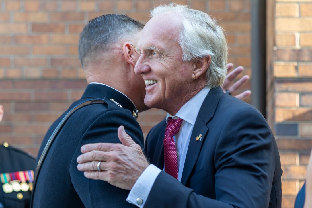 Mr. Greg Norman, Chief Executive Officer, Chairman and founder of the Greg Norman Company, is greeted by U.S. Marine Corps Lt. Gen. Leonard F. Anderson IV, commander of Marine Forces Reserve and Marine Forces South, prior to a Friday Evening Parade at Marine Barracks Washington, D.C., Aug. 8, 2025. Norman was the guest of honor for the Evening Parade. (U.S. Marine Corps photo by Sgt. Samuel Qin)