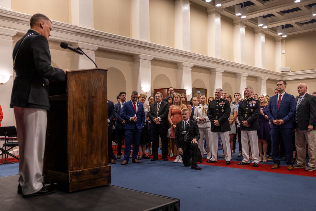 Lt. Gen. Leonard F. Anderson IV, commander of Marine Forces Reserve and Marine Forces South, speaks at a reception prior to a Friday Evening Parade at Marine Barracks Washington, D.C., Aug. 8, 2025. The Friday Evening Parade is a symbol of tradition and heritage of the Marine Corps. This parade, hosted by Anderson was held in honor of Mr. Greg Norman, Chief Executive Officer, Chairman and founder, Greg Norman Company. (U.S. Marine Corps photo by Sgt. Samuel Qin)