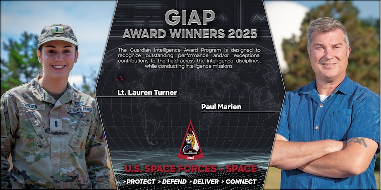 two award winners pose for a photo