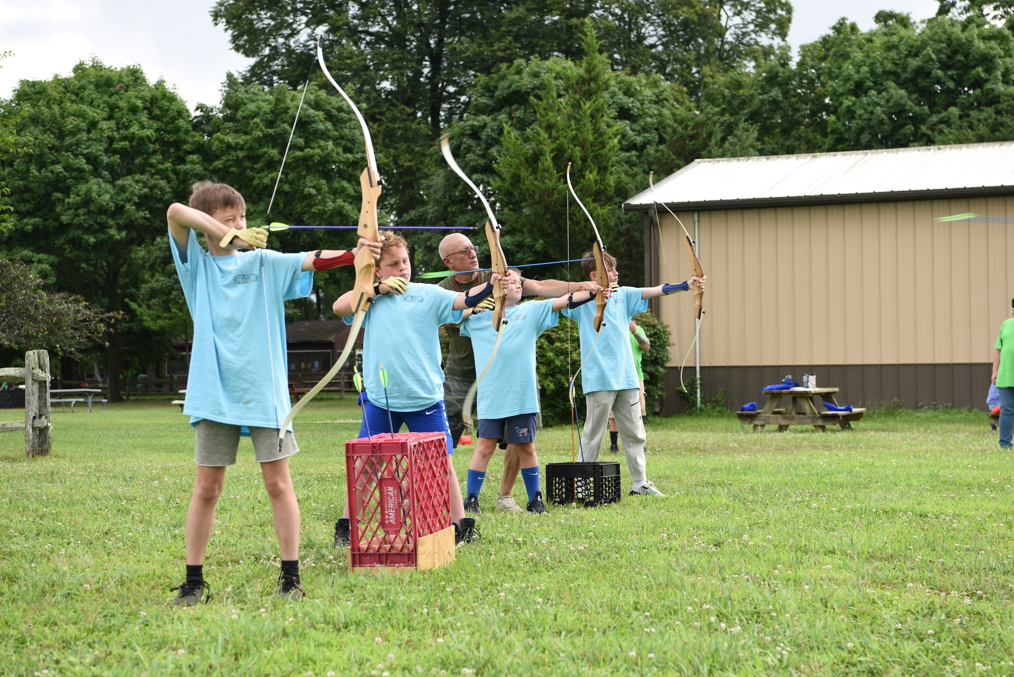 Galaxy Campers, children of Airmen from the 106th Rescue Wing, participate in archery training at Suffolk County Farm and Education Center, Yaphank, N.Y., July 15, 2025.