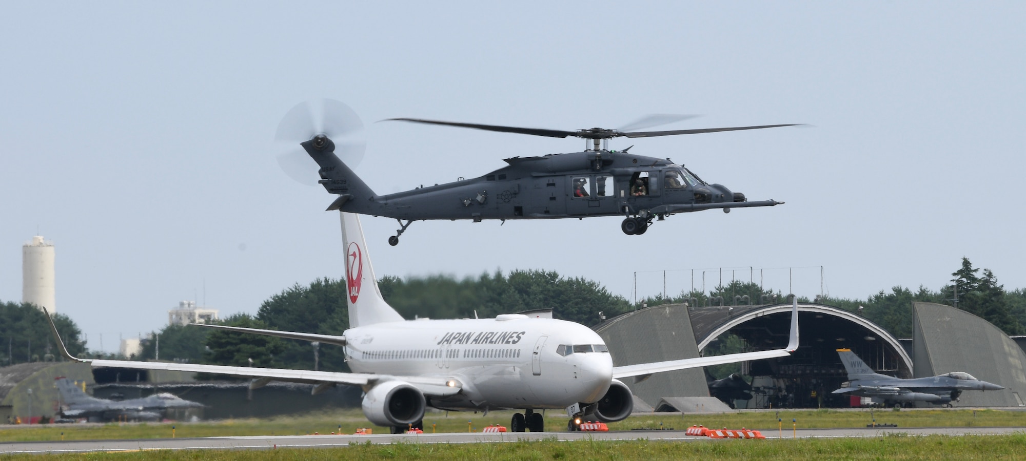 A U.S. Air Force HH-60W Jolly Green II rescue helicopter assigned to the 106th Rescue Wing, New York Air National Guard, flying over Misawa Air Base during exercise Resolute Force Pacific (REFORPAC) 2025 at Misawa Air Base, Japan, July 16, 2025.