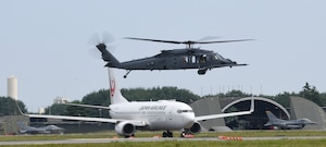 A U.S. Air Force HH-60W Jolly Green II rescue helicopter assigned to the 106th Rescue Wing, New York Air National Guard, flying over Misawa Air Base during exercise Resolute Force Pacific (REFORPAC) 2025 at Misawa Air Base, Japan, July 16, 2025.