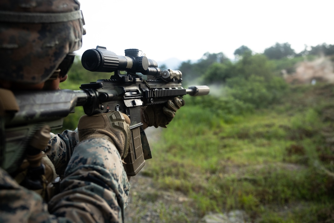 A U.S. Marine with 2nd Battalion, 23rd Marines, forward deployed with 4th Marine Regiment, 3d Marine Division as part of the Unit Deployment Program, conducts a reaction to contact drill during the Korean Marine Exercise Program 25.2 in Pocheon, South Korea, July 29, 2025. KMEP is conducted regularly between the ROK and U.S. Marine Corps to increase their combined capabilities through realistic training geared towards deterrence and maintaining peace in the Indo-Pacific. (U.S. Marine Corps photo by Lance Cpl. Van Hoang)