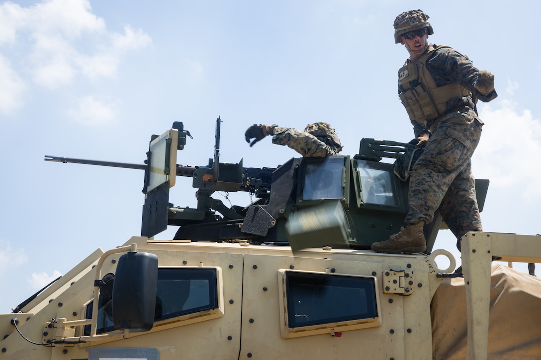 U.S. Marines with 2nd Battalion, 23rd Marines, forward deployed with 4th Marine Regiment, 3d Marine Division as part of the Unit Deployment Program, fire an M2 machine gun during the Korean Marine Exercise Program 25.2 in Pocheon, South Korea, July 29, 2025. KMEP is conducted regularly between the ROK and U.S. Marine Corps to increase their combined capabilities through realistic training geared towards deterrence and maintaining peace in the Indo-Pacific. (U.S. Marine Corps photo by Lance Cpl. Van Hoang)