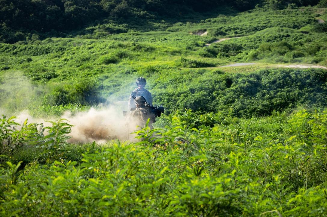 U.S. Marines with 2nd Battalion, 23rd Marines, forward deployed with 4th Marine Regiment, 3d Marine Division as part of the Unit Deployment Program, fire an M3E1 Multi-purpose Anti-armor Anti-personnel Weapon System (MAAWS) during the Korean Marine Exercise Program 25.2 in Pocheon, South Korea, July 29, 2025. KMEP is conducted regularly between the ROK and U.S. Marine Corps to increase their combined capabilities through realistic training geared towards deterrence and maintaining peace in the Indo-Pacific. (U.S. Marine Corps photo by Lance Cpl. Van Hoang)