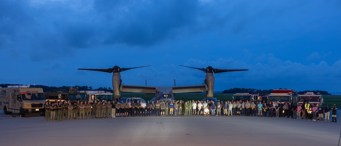 U.S. Marines and civilians from Marine Corps Air Station Cherry Point, MCAS New River and emergency responders from neighboring counties are photographed at the culmination of a training event at Michael J. Smith Field airport, North Carolina, July 31, 2025.