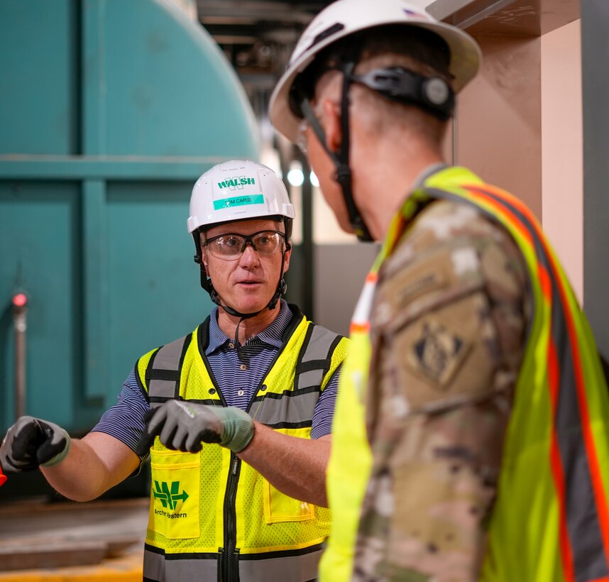 Tom Caplis, senior vice president of the Walsh Group’s Healthcare Division, left, talks with Col. Andrew Baker, U.S. Army Corps of Engineers Los Angeles District commander, during a tour of the nearly complete Spinal Cord Injury/Community Living Center building Aug. 7 at the Jennifer Moreno Veterans Affairs Medical Center in San Diego.