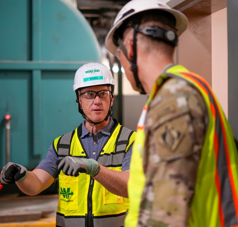 Tom Caplis, senior vice president of the Walsh Group’s Healthcare Division, left, talks with Col. Andrew Baker, U.S. Army Corps of Engineers Los Angeles District commander, during a tour of the nearly complete Spinal Cord Injury/Community Living Center building Aug. 7 at the Jennifer Moreno Veterans Affairs Medical Center in San Diego.