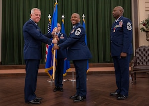 Woods accepting guidon