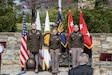 From left to right, Brig. Gen. Joseph Baldwin, deputy director Army National Guard Col. Natalie Lewellen deputy general counsel Army National Guard and Maj. Gen. Bobby Christine, judge advocate general Army stand during the playing of the national anthem. Lewellen was promoted to Brigadier General during a ceremony held April 18, 2025, at the Herbert R. Temple Jr. Army National Guard Readiness Center in Arlington, Virginia. (photo by Ethan Ford)