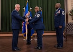 Woods accepting guidon