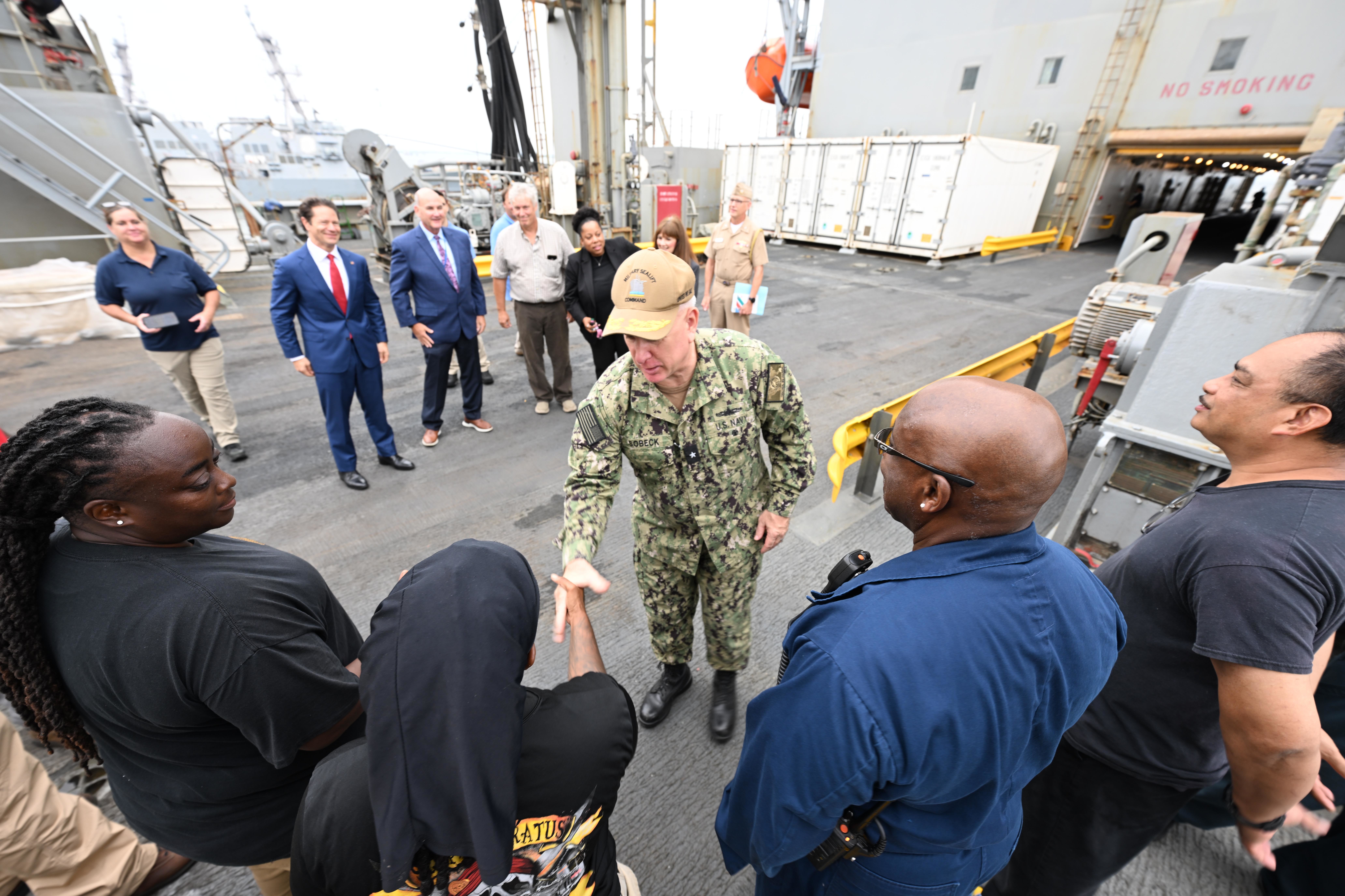 Rear Adm. Philip E. Sobeck, Commander, Military Sealift Command, addresses the crew of USNS Patuxent (T-AO 201) during a ship tour, aboard the ship August 13, 2025.