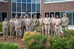 U.S. Air Force members from the Colorado Air National Guard (ANG), and Royal Jordanian air force (RJAF) members pose for a group photo I.G. Brown Training and Education Center, July 31, 2021, McGhee Tyson Air National Guard Base, Tennessee.  As part of a State Partnership Program initiative, the Colorado Air National Guard requested TEC University’s assistance to explore ways to help their partner nation develop its first formal enlisted professional military education.